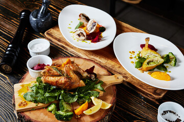 fried chicken Kiev cutlet and roll on a brown table