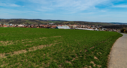 Hustopece town with smaller hills above in Czech republic