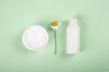 Fototapeta na wymiar women cosmetics for skin care, organic cosmetics based on medicinal herbs flat lay.