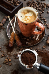 Cup of coffee, coffee beans and ground coffee