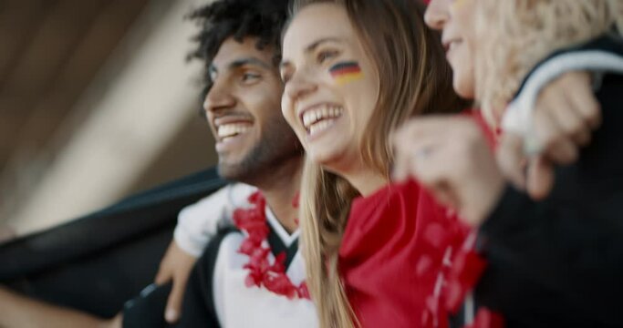 German soccer supporters jumping in fan zone