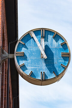 Malmo, Sweden June 12, 2021 An old landmark clock on the Kockums Shipyard reads, 11.55.