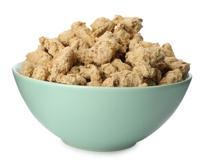Dehydrated soy meat chunks in bowl on white background