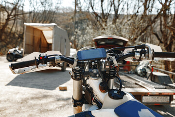 Close-up details of cross motorcycle parked on ground
