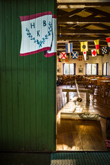 Stockholm, Sweden  A boat club flagpole lies inside the clubhouse after painting to dry.