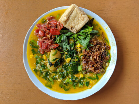 Top View Of Traditional Bubur Manado Tinutuan (Manadonese Porridge) In A Bowl