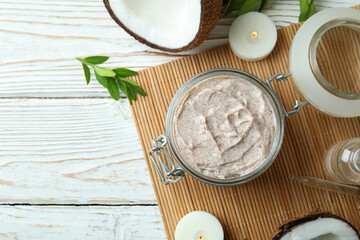 Skin care scrub on white wooden background