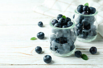 Fresh berry concept with blueberry on white wooden table