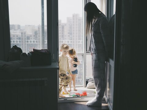 Children Rage, Play Hide And Seek, Hide Under The Table And Laugh, Jump On The Couch