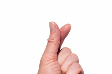 A hand making a heart shape with two fingers on a white isolated background. Korean symbol of love with fingers