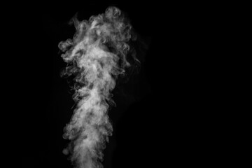 Perfect mystical curly white steam or smoke isolated on black background. Abstract background fog or smog