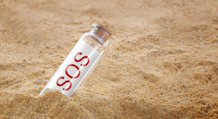 SOS or Save Our Ship letter on a glass bottle on sand beach, Need Help concept © kardd