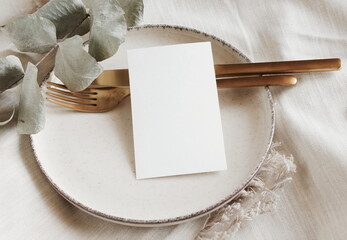 Menu card mockup on empty modern minimal table place setting neutral beige color.  Space for text....