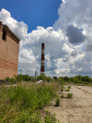 Fototapeta na wymiar abandoned industrial area on a background of beautiful sky