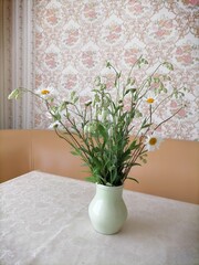 Bouquet of wild flowers on the table