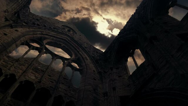Dramatic Sun Appears Above Abbey Ruins