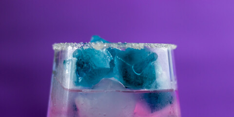sugar dough on a glass with a cocktail close-up