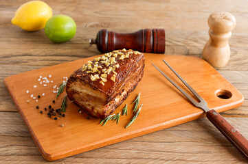 Homemade Smoked Barbecue Beef Brisket on wooden cutting board before cutting
