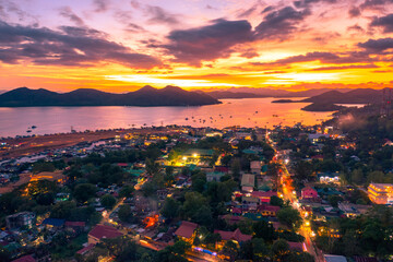 Amazing tropical sunset at the sea at Coron island, Busuanga, Philippines. Sea aerial view.