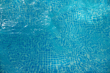 Fototapeta premium Beautiful refreshing blue swimming pool water in summer