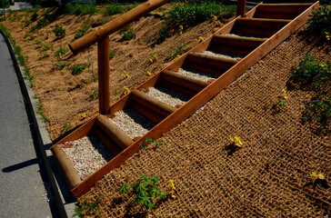 temporary covering of the lawn sowing with textiles to ensure a large slope against erosion. using...