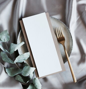 Menu Card Mockup On Empty Modern Minimal Table Place Setting Neutral Beige Color.  Space For Text. Scandinavian Style.