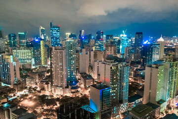 Night view of Skyscrapers Makati, the business district of Metro Manila, Philippines.