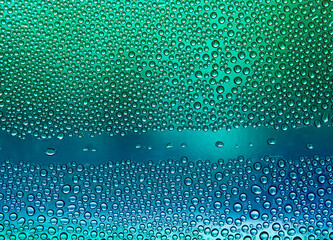 Water drops on misted glass are bright and beautiful even form water background