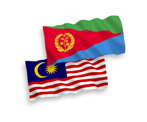 National vector fabric wave flags of Eritrea and Malaysia isolated on white background. 1 to 2 proportion.