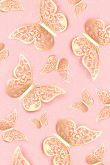 Festive background made with gold tracery illuminating butterflies and with shiny confetti on pink....
