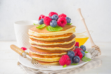 Pancakes stack with fresh berries