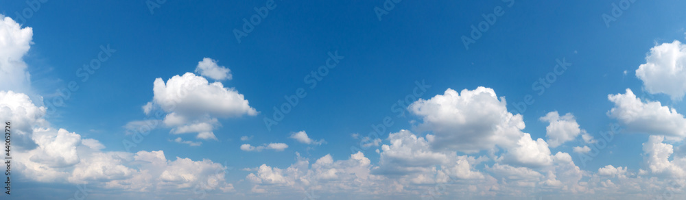 Wall mural blue sky background with tiny clouds. panorama background