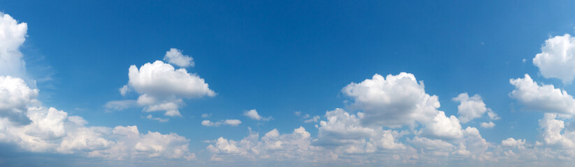 Blue Sky background with tiny Clouds. Panorama background