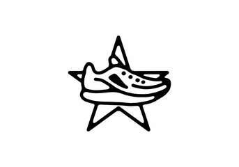 Black line art illustration of shoes and star