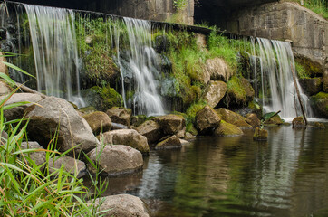 Kazdanga village mill locks with a waterfall, Latvia.