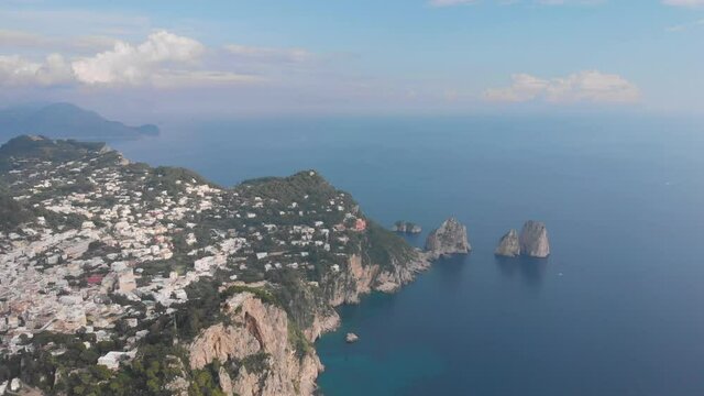 Aerial drone view to Capri island. Tyrrhenian Sea, coastline, Italy