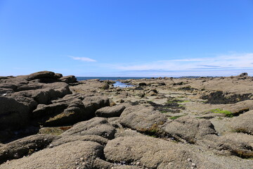 Fototapeta na wymiar Bay de concarneau, France, Brittany, June 2021, beach and rocks