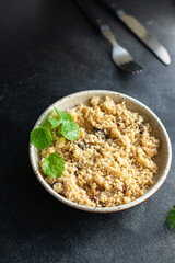 couscous no meat vegetable spices appetizer portion dish on the table healthy food meal snack copy space food background rustic top view 
