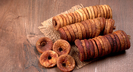 Fresh Figs or Anjeer fruit healthy vegan food concept organic dry fruits on wooden background.