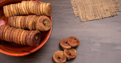 Fresh Figs or Anjeer fruit healthy vegan food concept organic dry fruits on wooden background.
