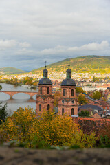 Beautiful postcard view from castle on old German Town Miltenberg am Main river in autumn