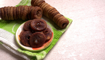 Fresh Figs or Anjeer fruit healthy vegan food concept organic dry fruits on wooden background.
