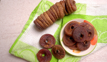 Fresh Figs or Anjeer fruit healthy vegan food concept organic dry fruits on wooden background.