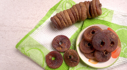 Fresh Figs or Anjeer fruit healthy vegan food concept organic dry fruits on wooden background.