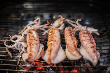 Char-grilled squid at a family party