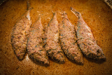 Red curry with mackerel on a cart in the Naklua market, Thailand.