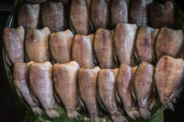 Sun-dried gourami sold in the Naklua market, Thailand.