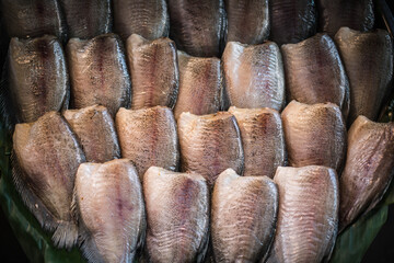 Sun-dried gourami sold in the Naklua market, Thailand.