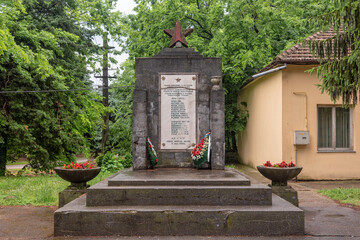 Bajsa, Serbia - June 06, 2021: Red Star On Memorial. A grave of soldiers from World War II in Serbia.