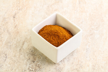 Dry Paprika powder in the bowl